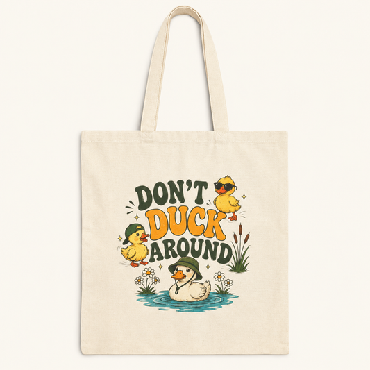 Don't Duck Around retro duck tote bag on cream background