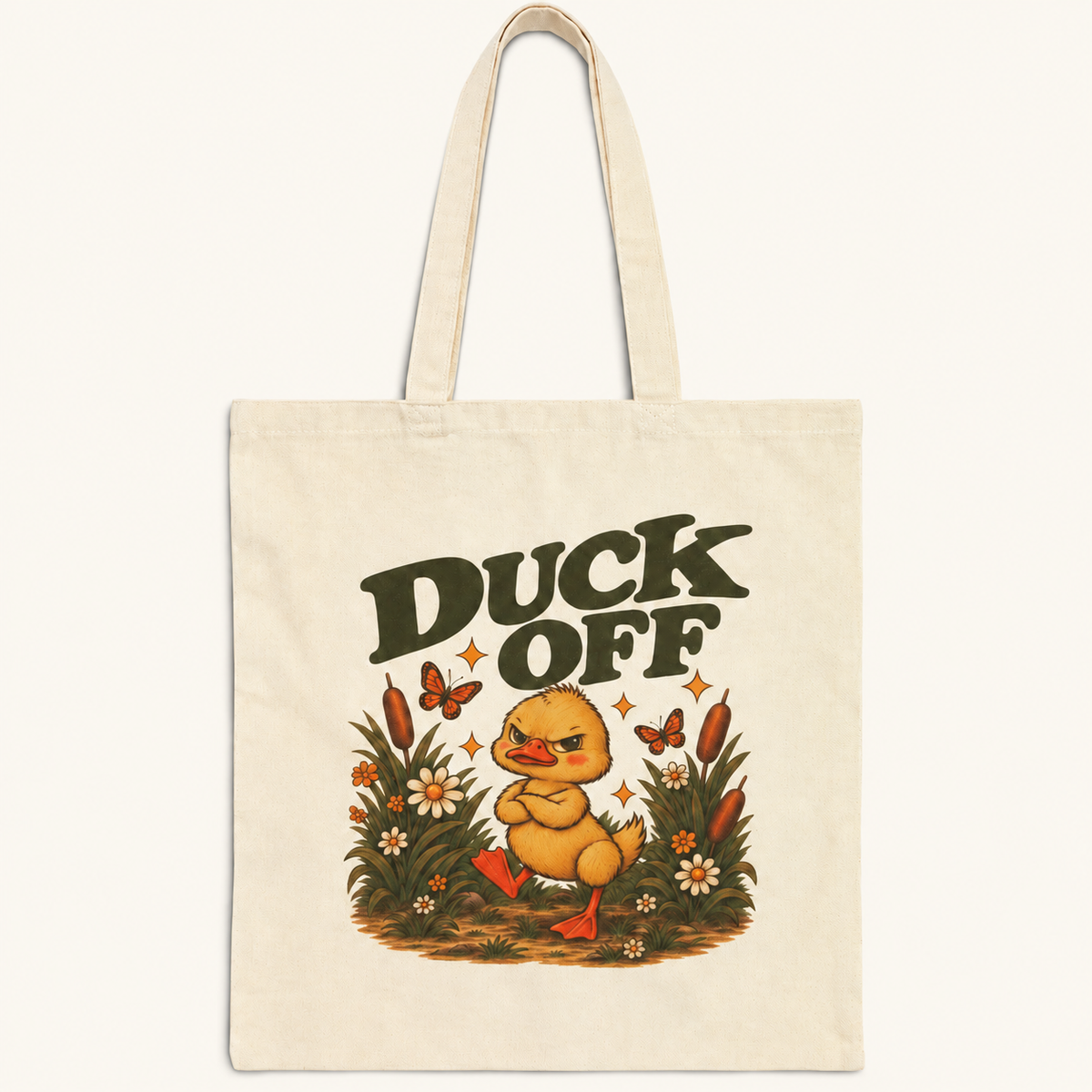 Duck Off grumpy duck tote bag on cream background
