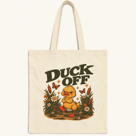 Duck Off grumpy duck tote bag on cream background